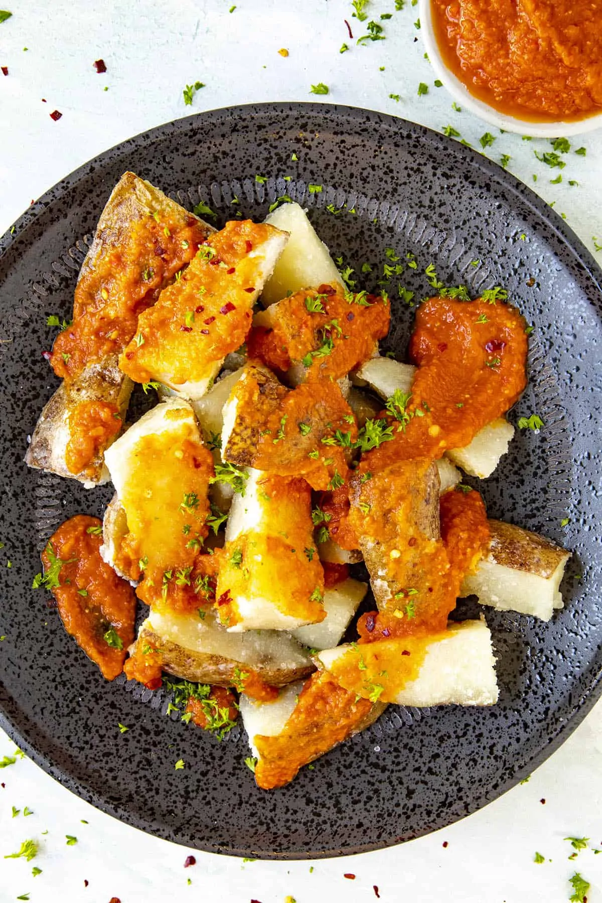 Patatas Bravas, ready to serve, on a plate