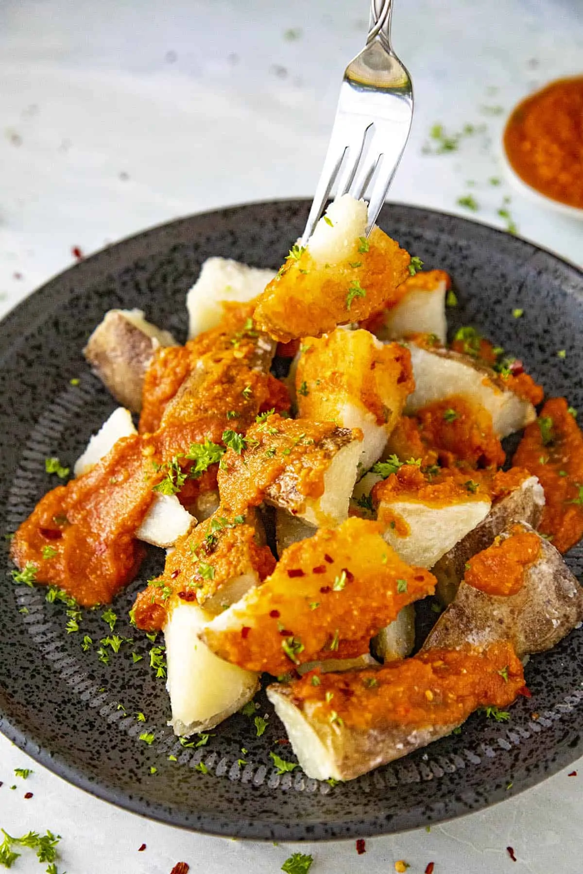 Patatas Bravas on a fork