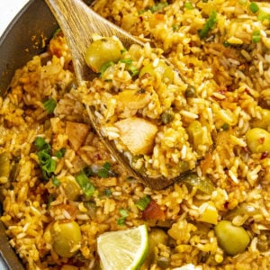 A spoonful of the Puerto Rican Arroz con Pollo