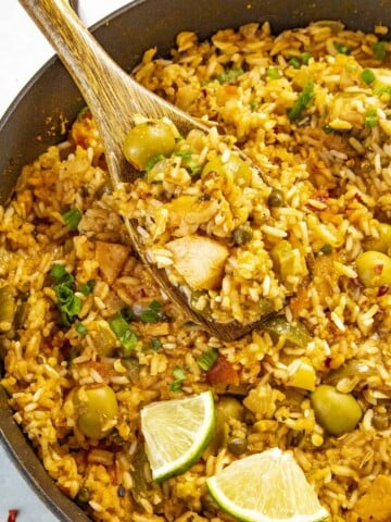 A spoonful of the Puerto Rican Arroz con Pollo