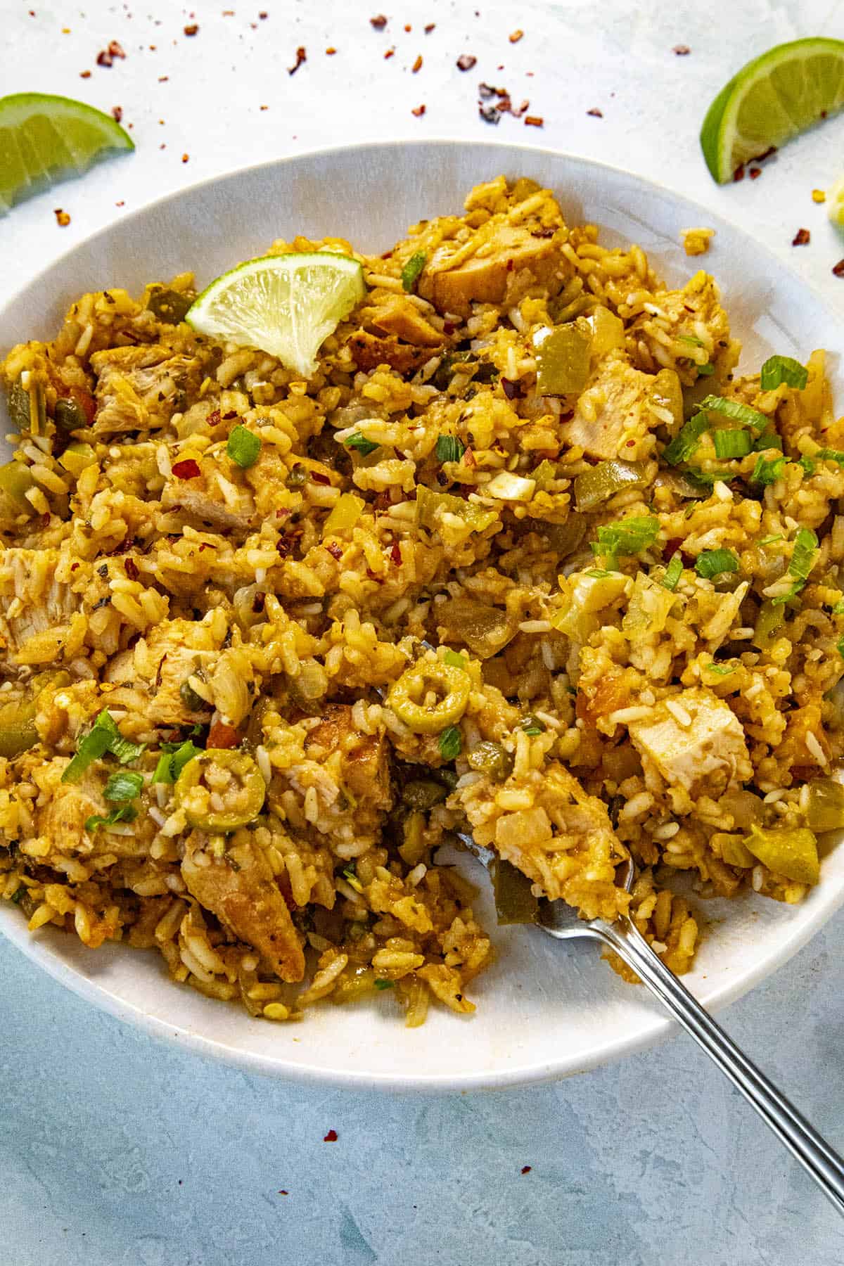 Taking a forkful of Puerto Rican Arroz con Pollo