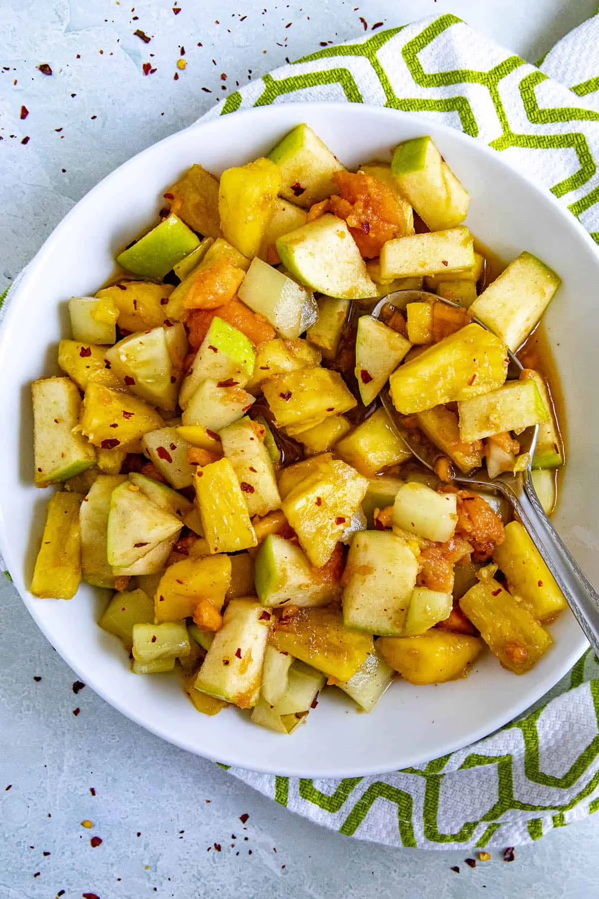 Rujak (Indonesian fruit salad) in a bowl with a spoon