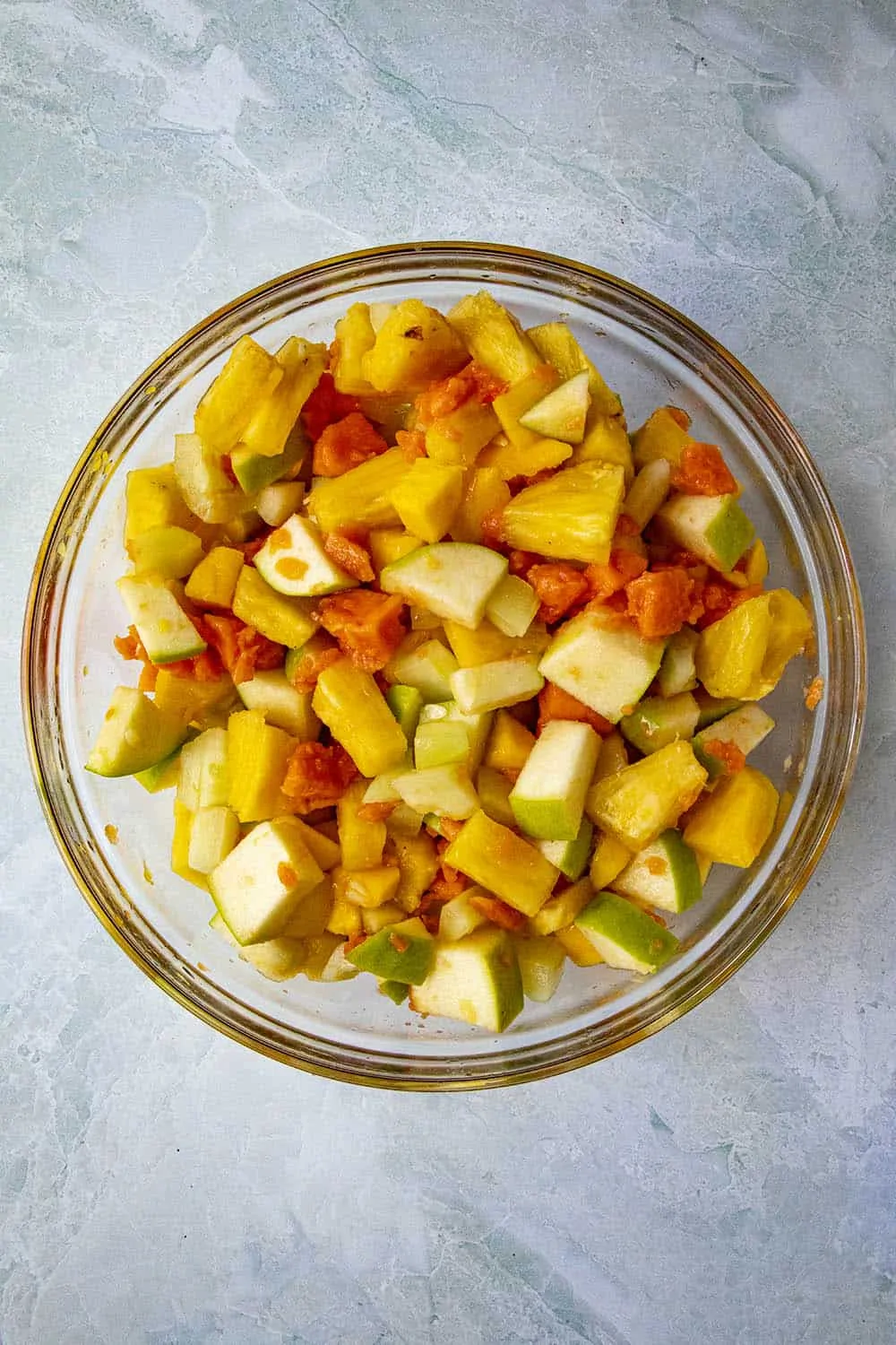 Rujak ingredients mixed into a bowl