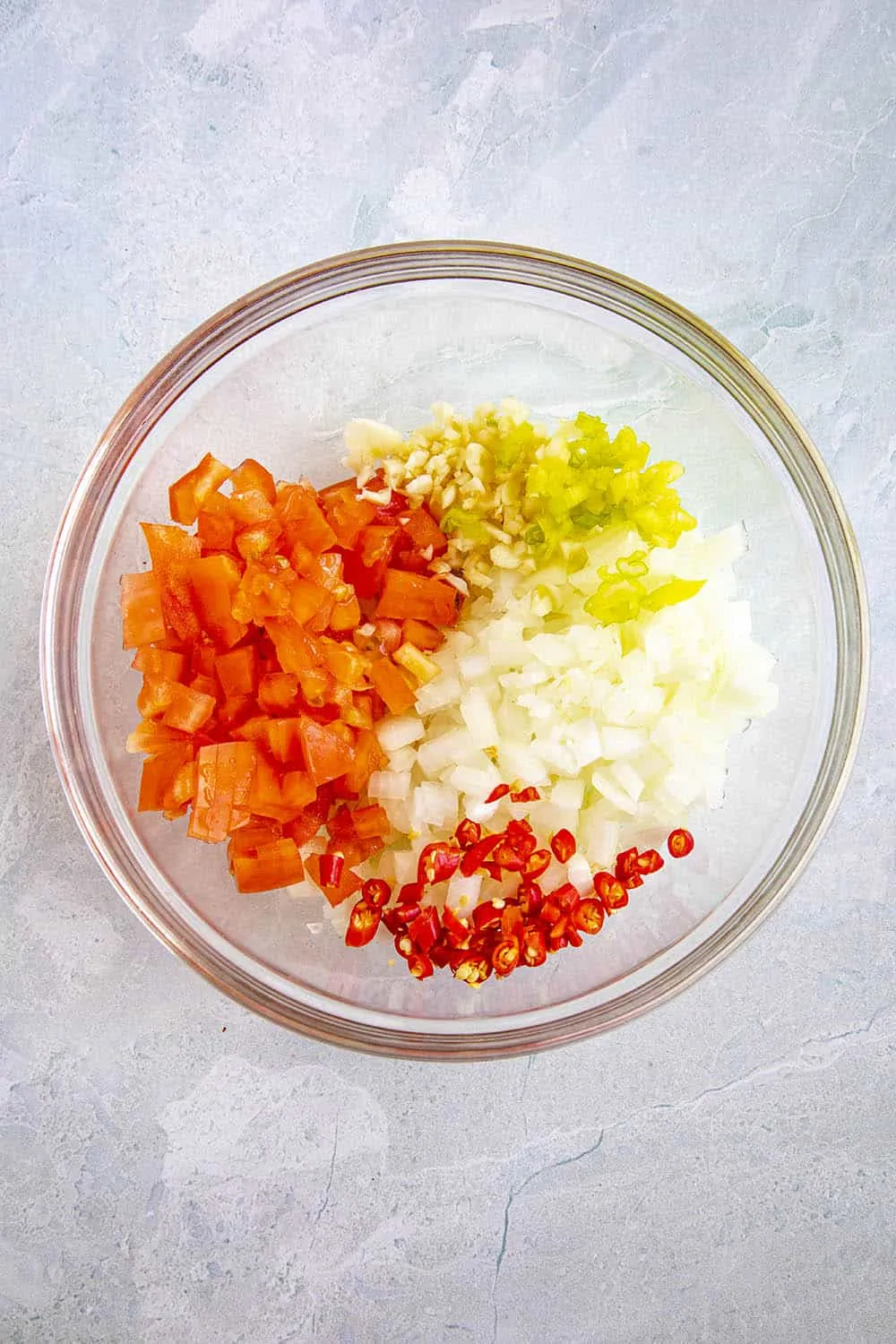 Sambal Matah ingredients in a bowl, ready for mixing