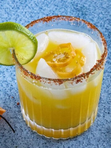 A glass full of the Spicy Mango Margarita