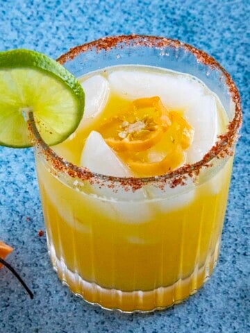 A glass full of the Spicy Mango Margarita