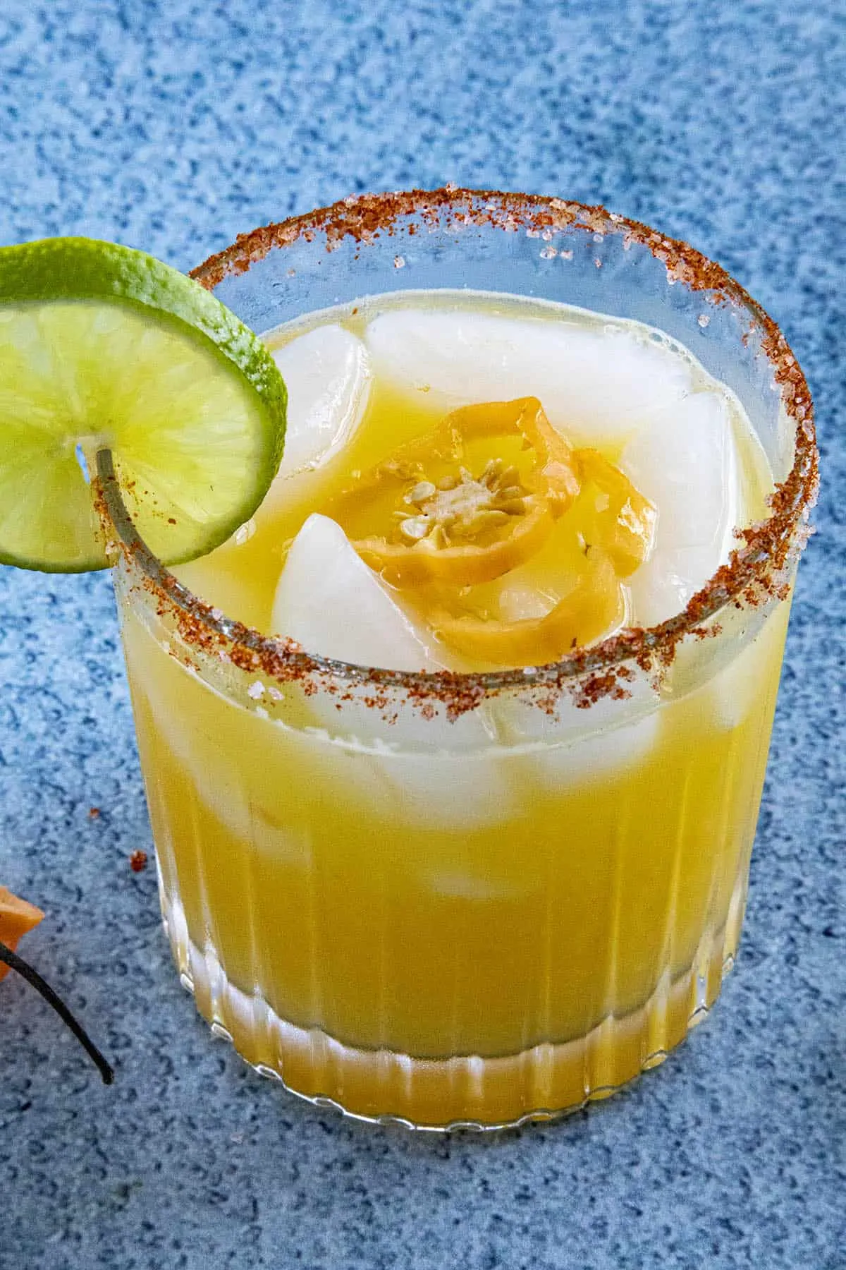 A glass full of the Spicy Mango Margarita