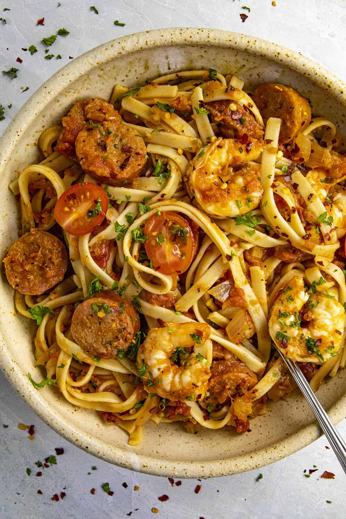 Cajun pasta in a bowl with lots of shrimp and andouille.