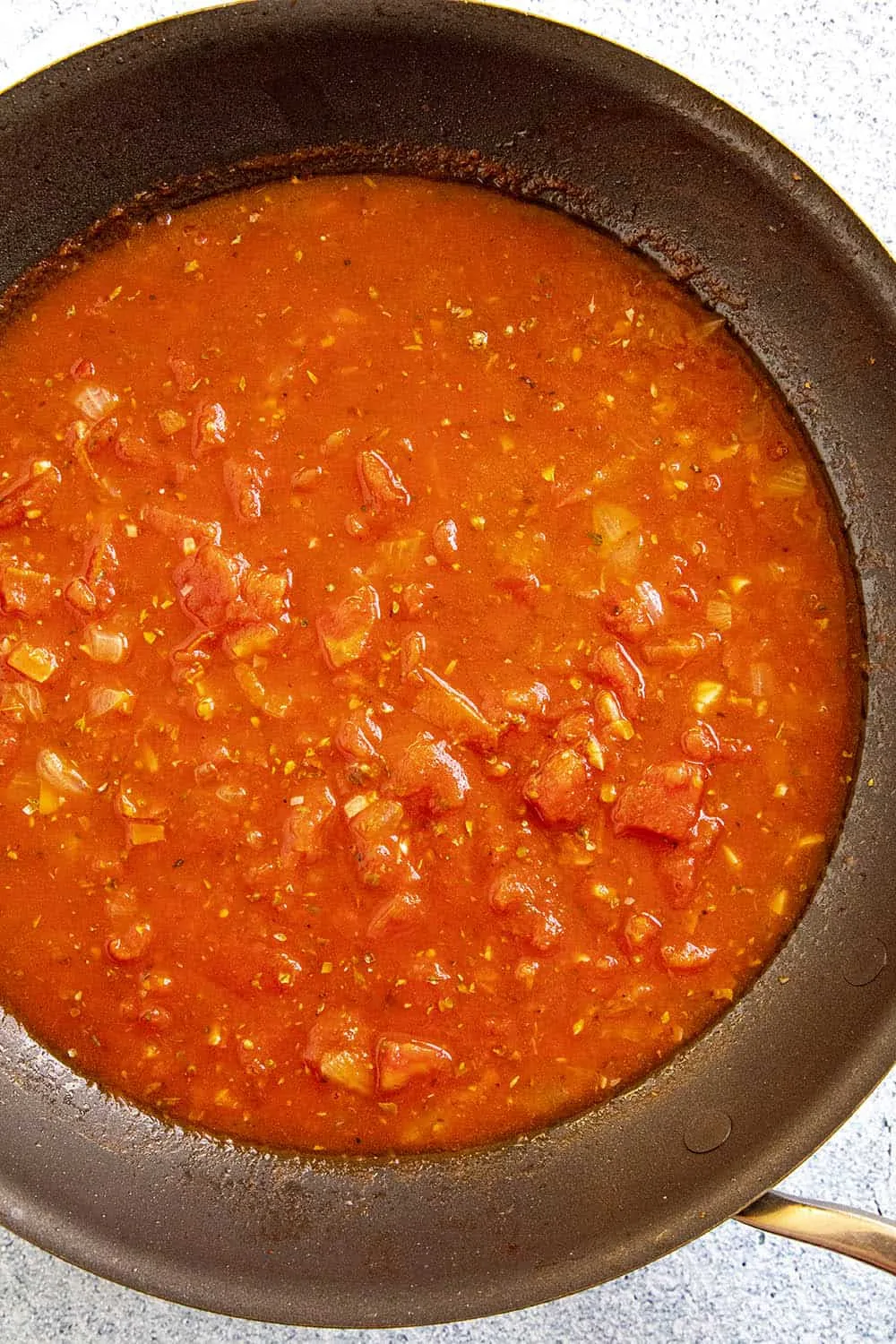Fra Diavolo Sauce simmering in a pan