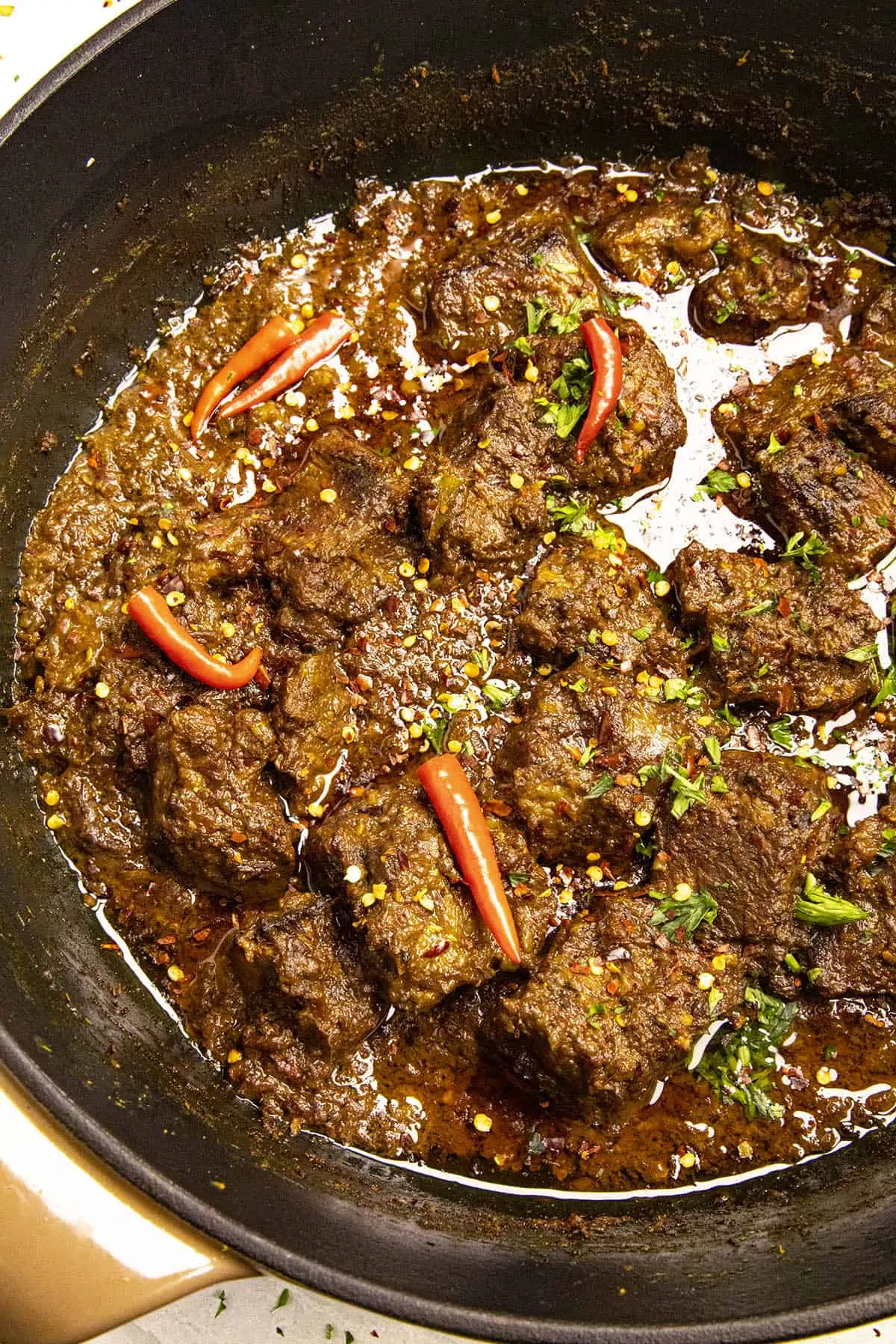 Beef Rendang simmering in a pot