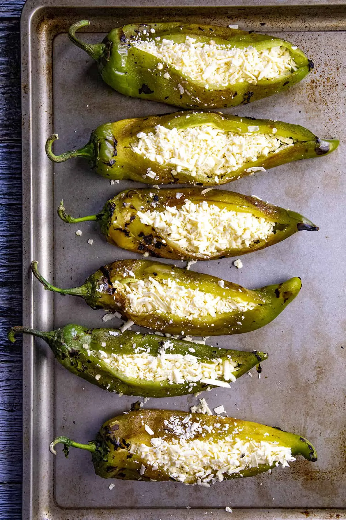 Stuffing roasted chiles with melty cheese