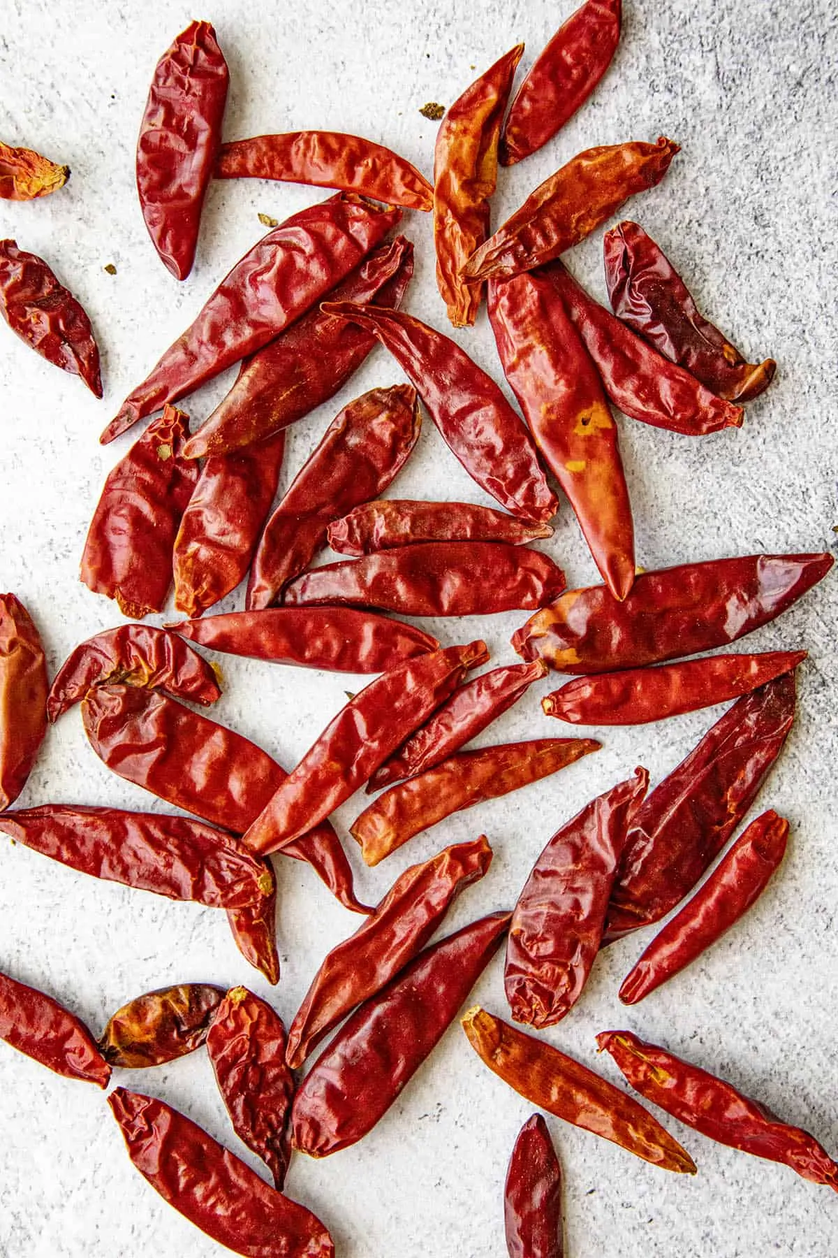Japones Peppers (Chile Japones) on the light surface.