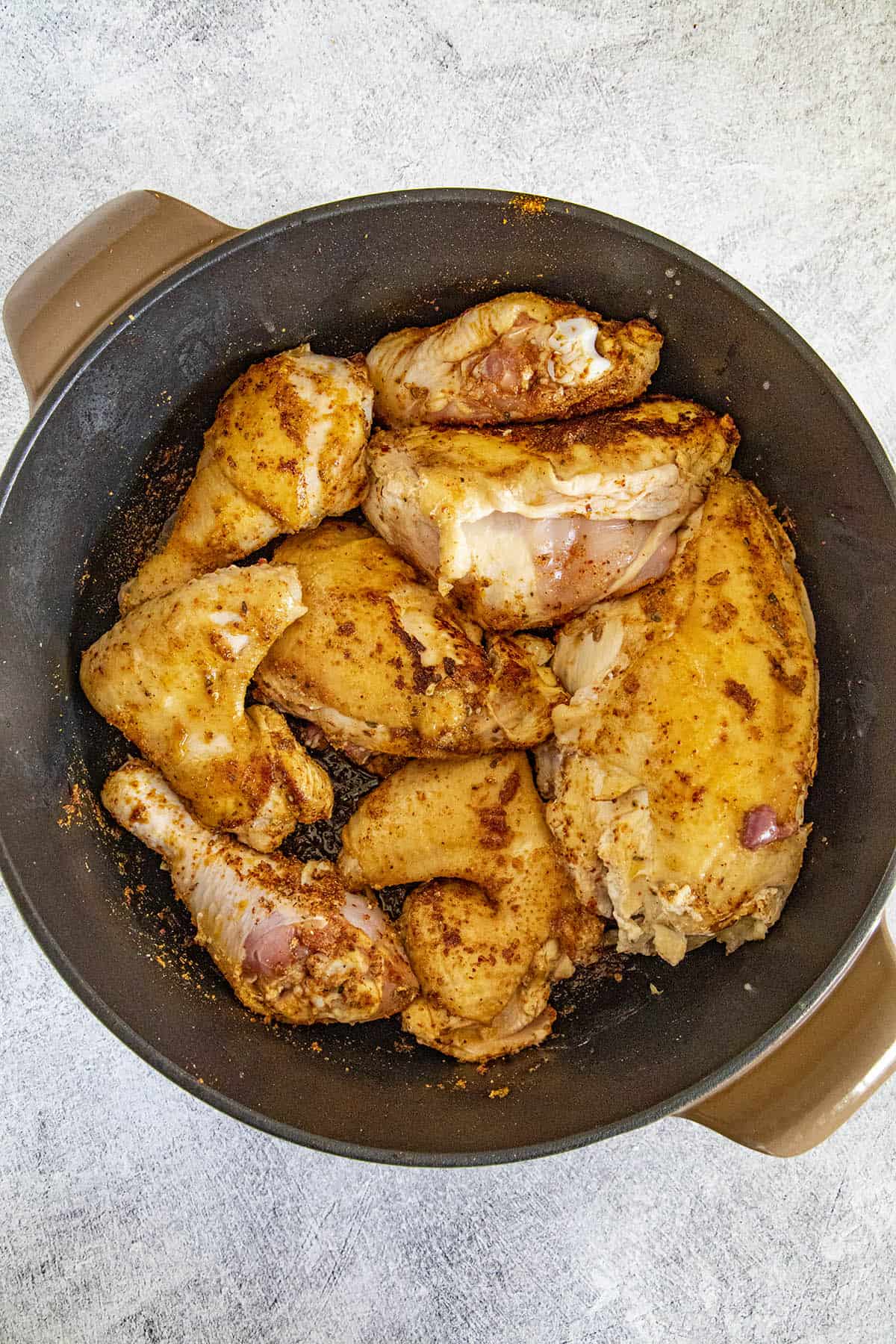 Browing the chicken in a large pot