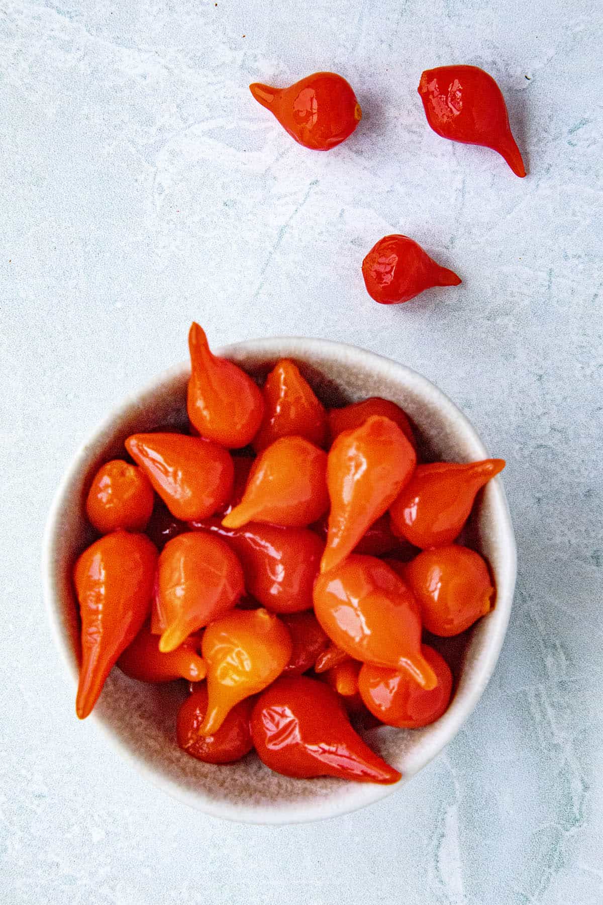 A handful of Roquito Peppers in a bowl