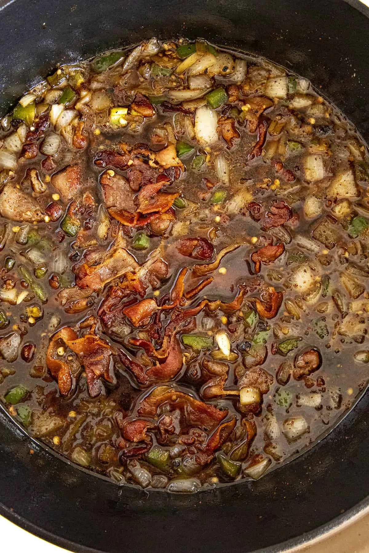 Bacon Jam starting to simmer in a pot