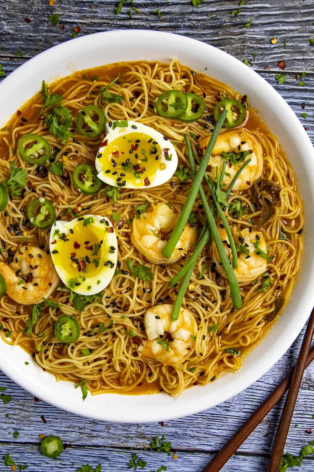 Spicy Ramen noodles in a bowl with lots of garnish