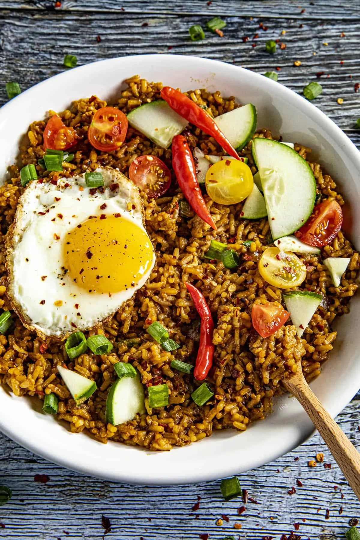 Nasi Goreng - Indonesian Fried Rice in a bowl with a fried egg on top