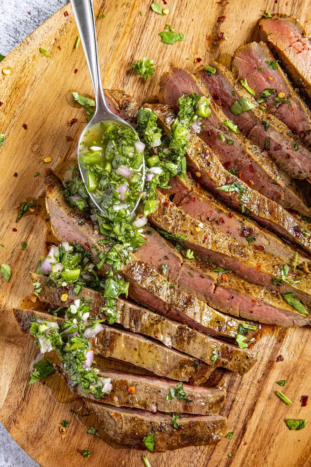 Serving up a platter of Chimichurri Steak.