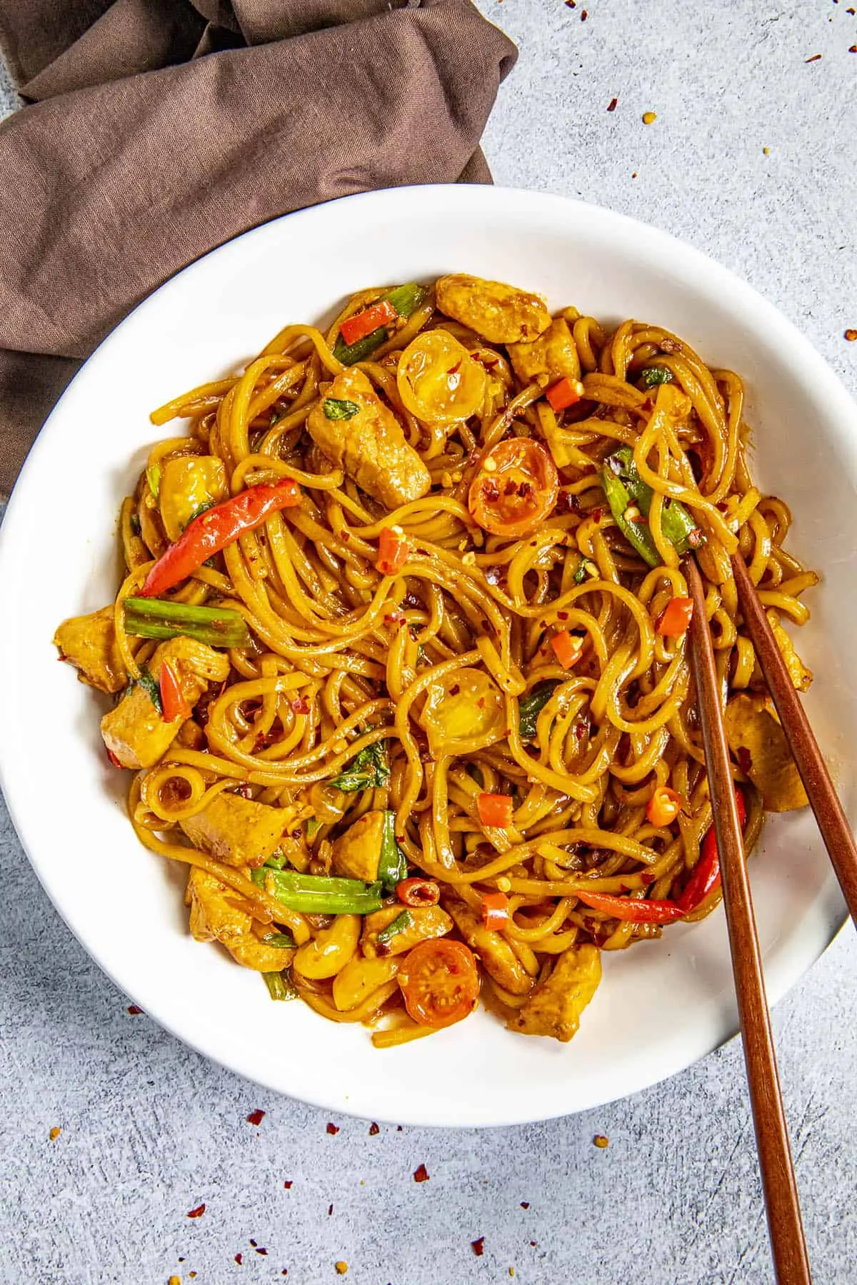 Drunken Noodles in a bowl with chopsticks