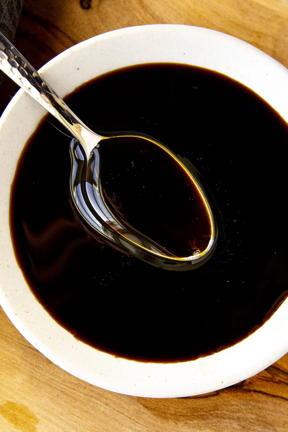 Kecap Manis (sweet soy sauce) in a bowl with a spoon