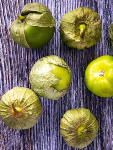 A bunch of tomatillos, ready for cooking