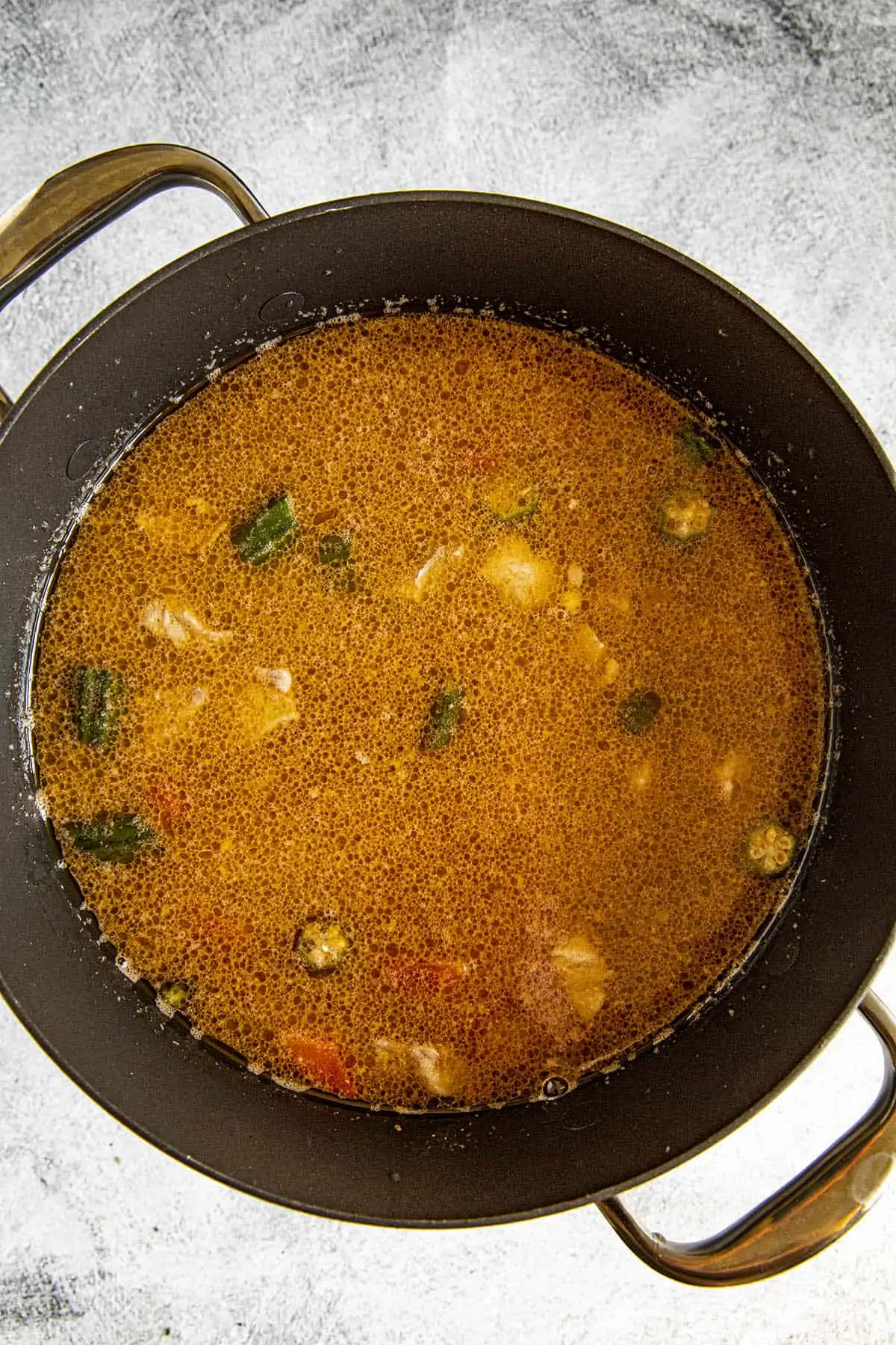 Burgoo ingredients in a pot, ready to simmer