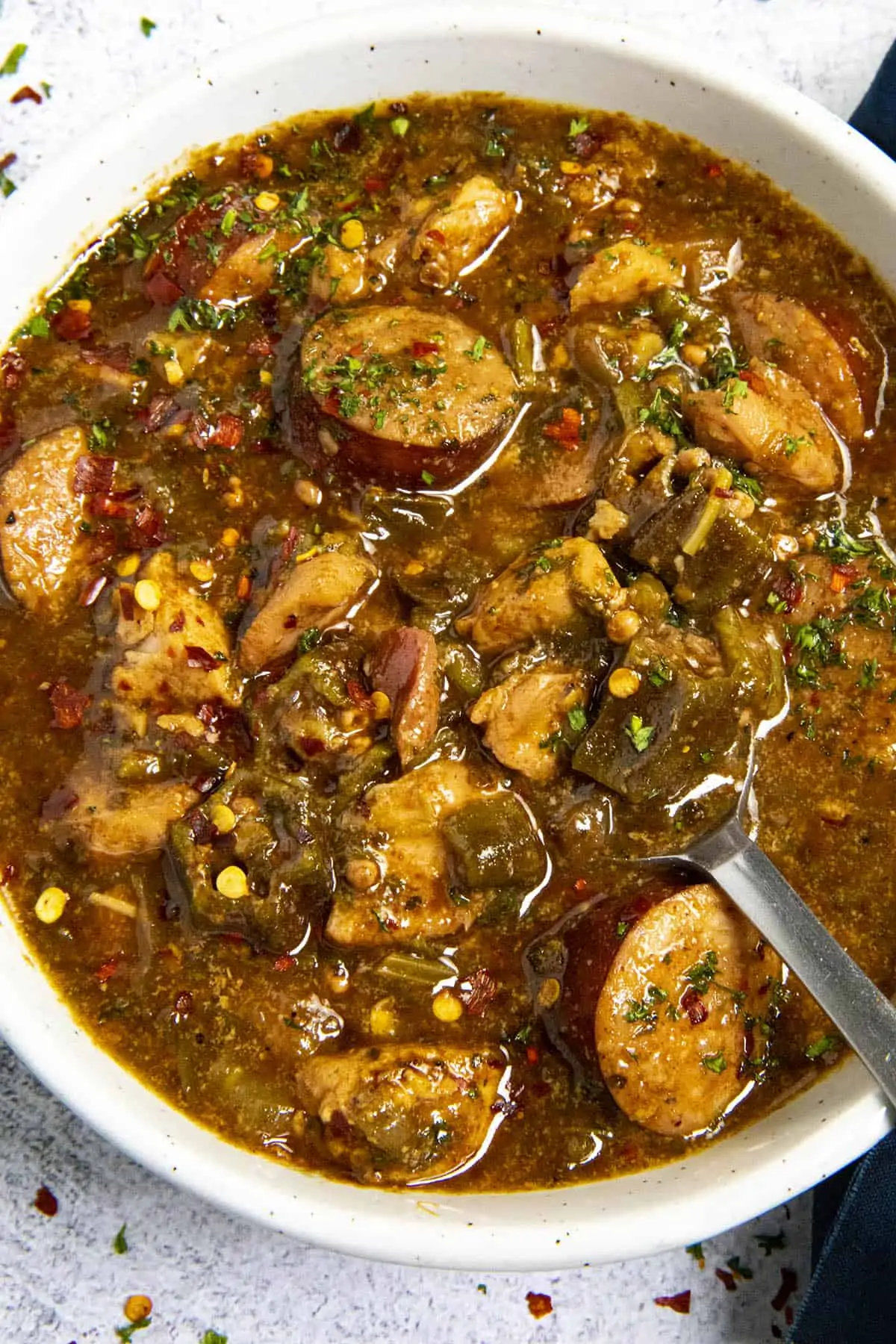 Cajun Chicken and Sausage Gumbo in a bowl with a spoon
