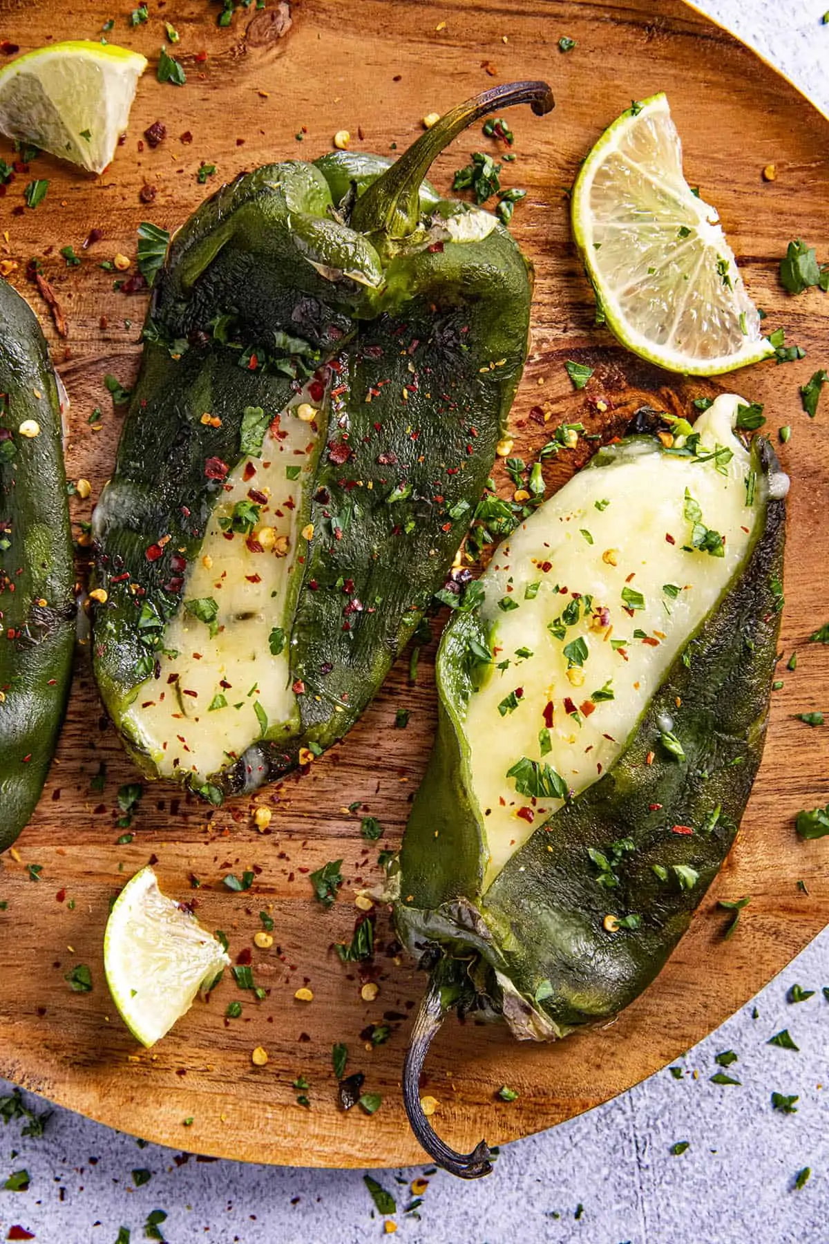 Poblano peppers stuffed with cheese on a plate