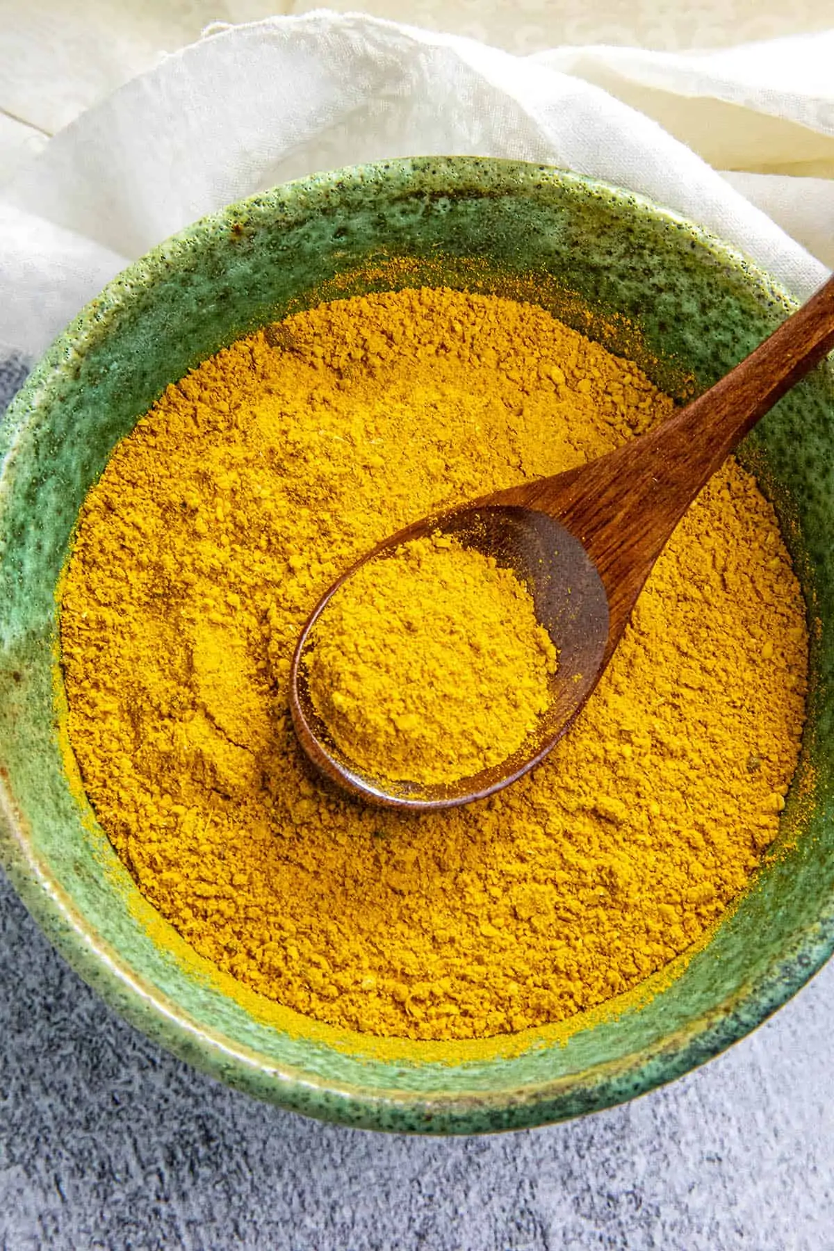 Jamaican Curry Powder on a spoon.