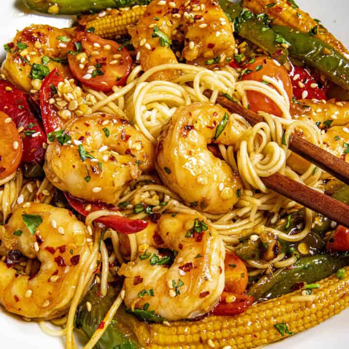 Mike taking a bite of Teriyaki Shrimp Stir Fry from the bowl