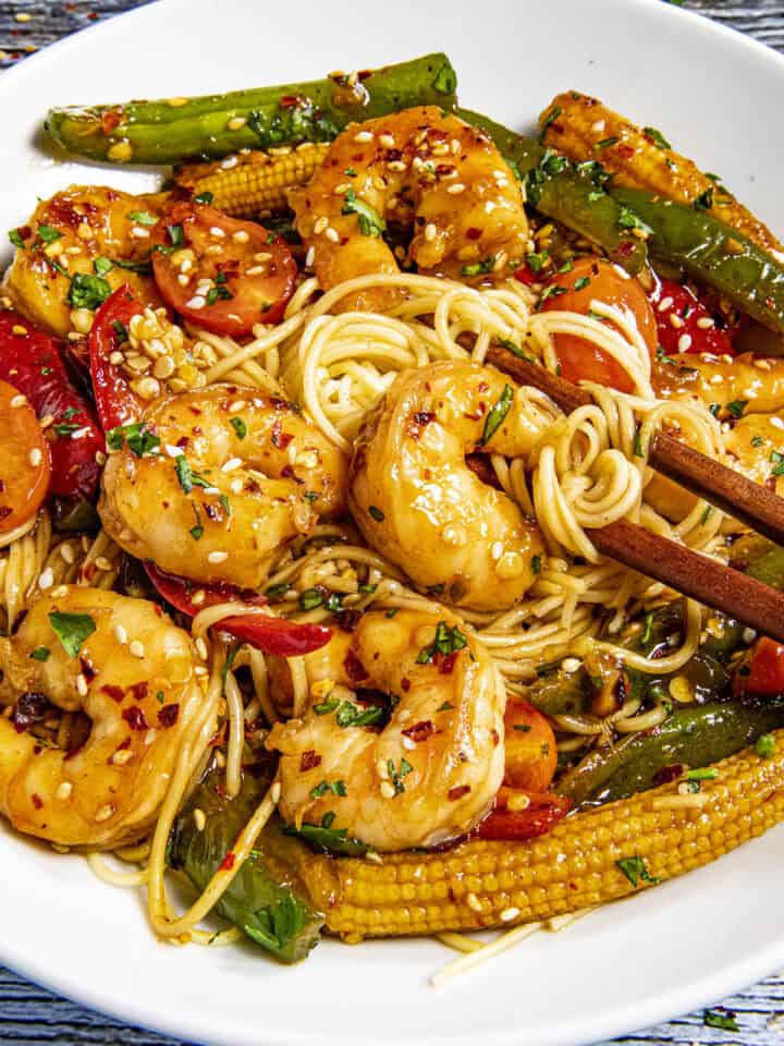 Mike taking a bite of Teriyaki Shrimp Stir Fry from the bowl