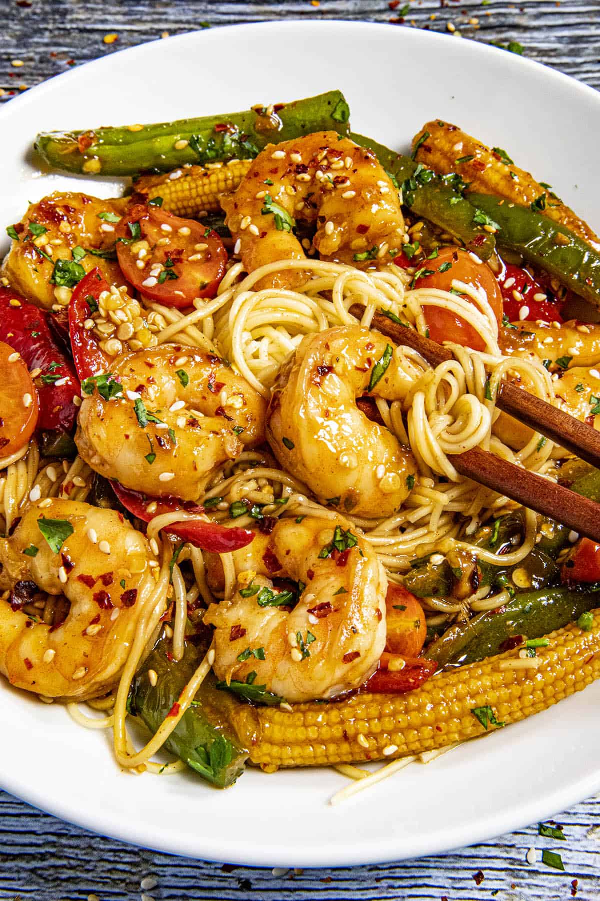 Mike taking a bite of Teriyaki Shrimp Stir Fry from the bowl