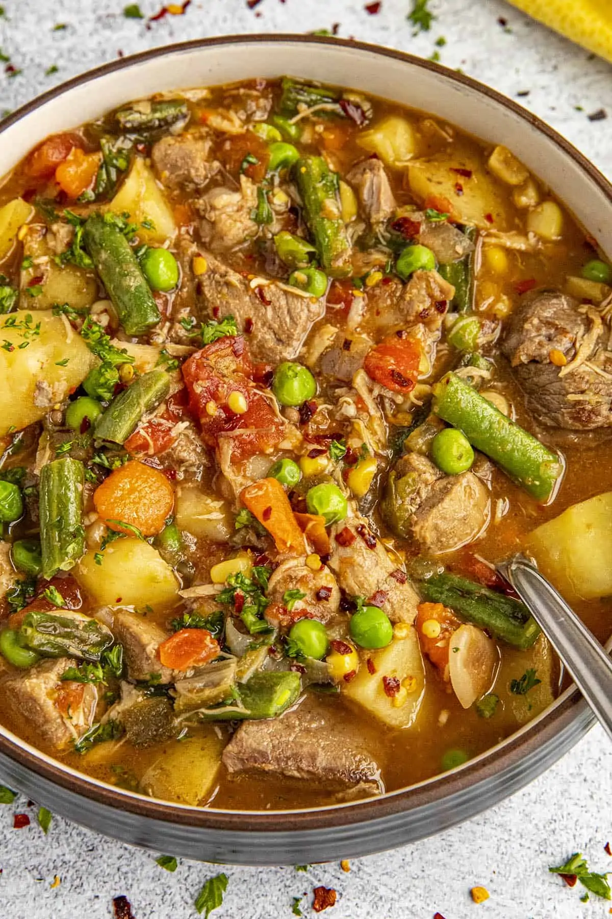 Chunky booyah stew with lots of meat and vegetables