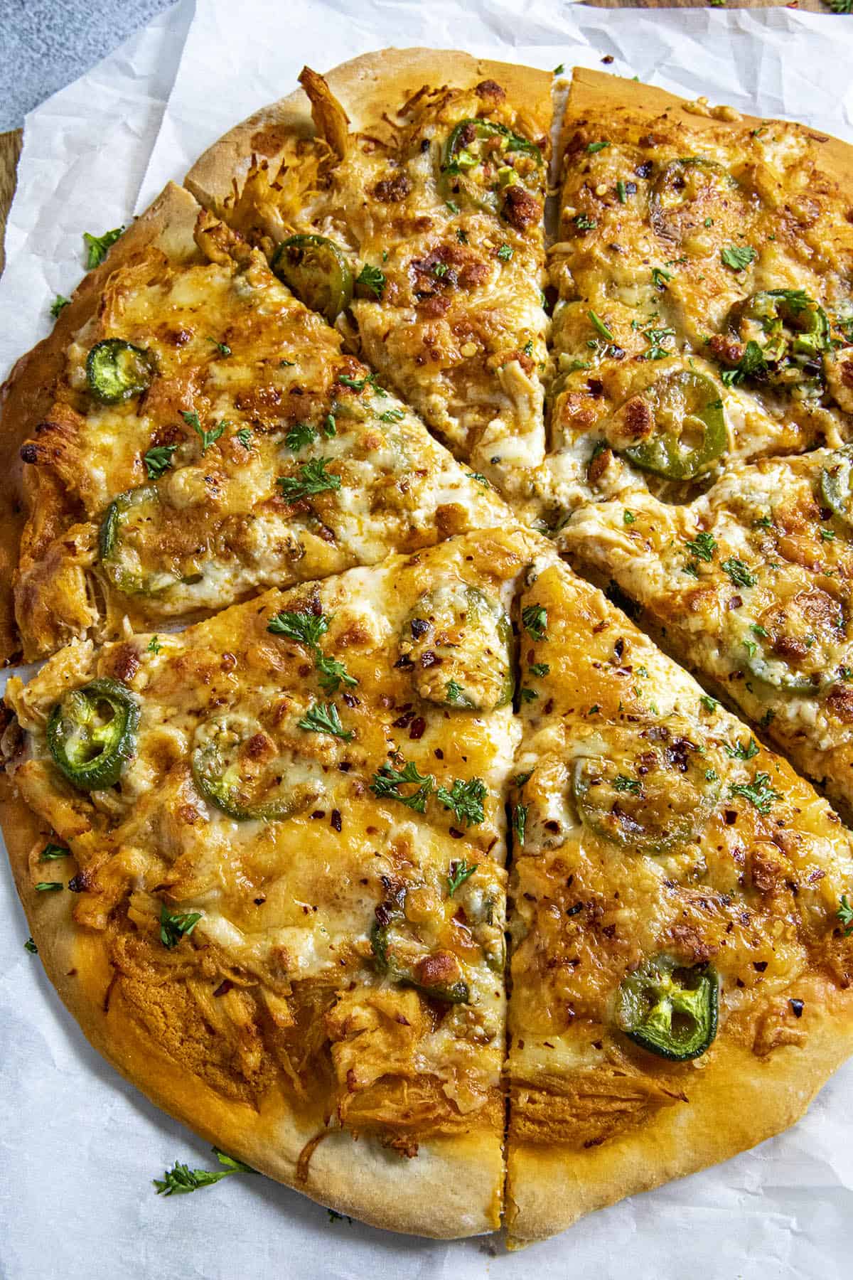 Buffalo Chicken Pizza, sliced and on a platter