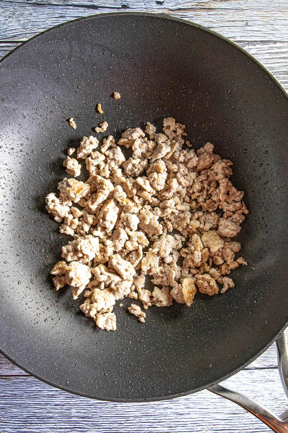 Cooking the pork for mapo tofu.