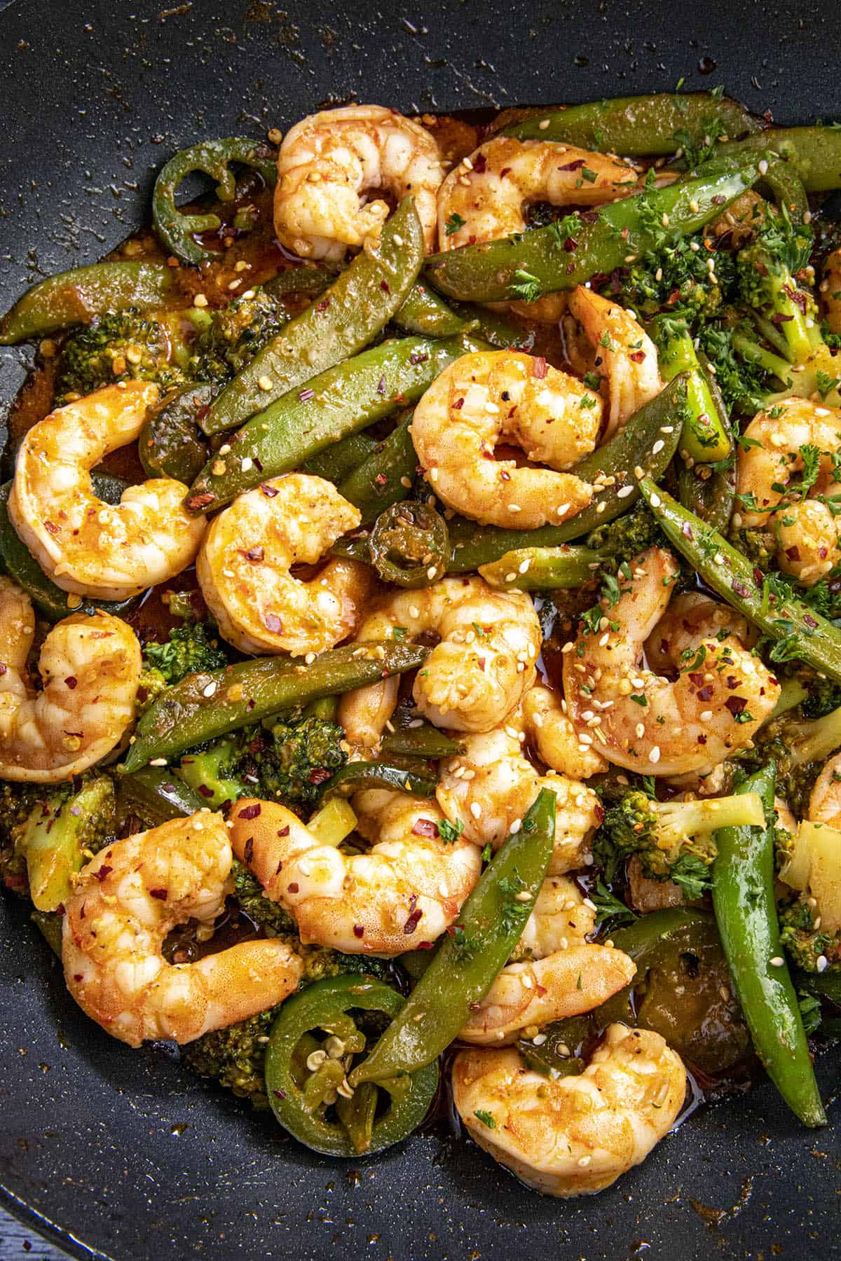 Spicy Shrimp Stir Fry Recipe in a wok with lots of shrimp and vegetables