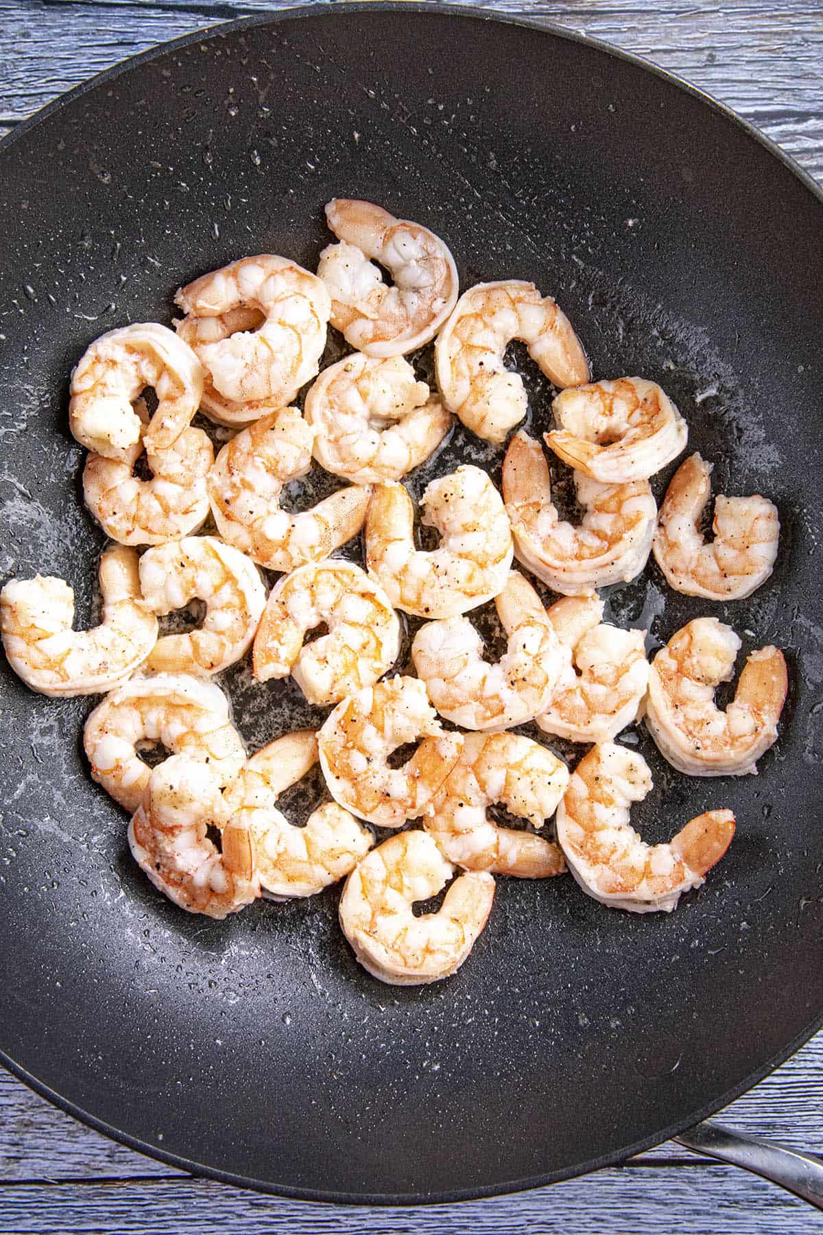 Cooking the shrimp in the wok