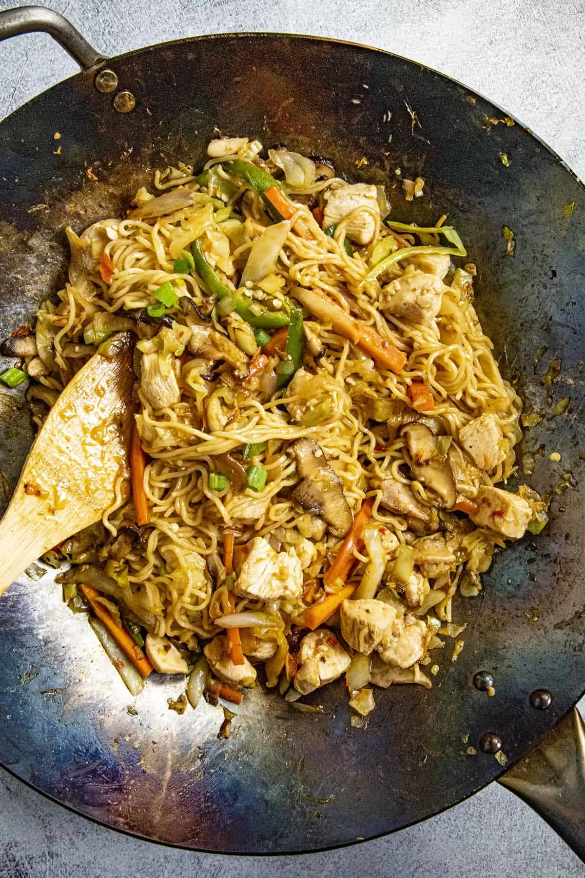Finishing the yakisoba noodles in the wok