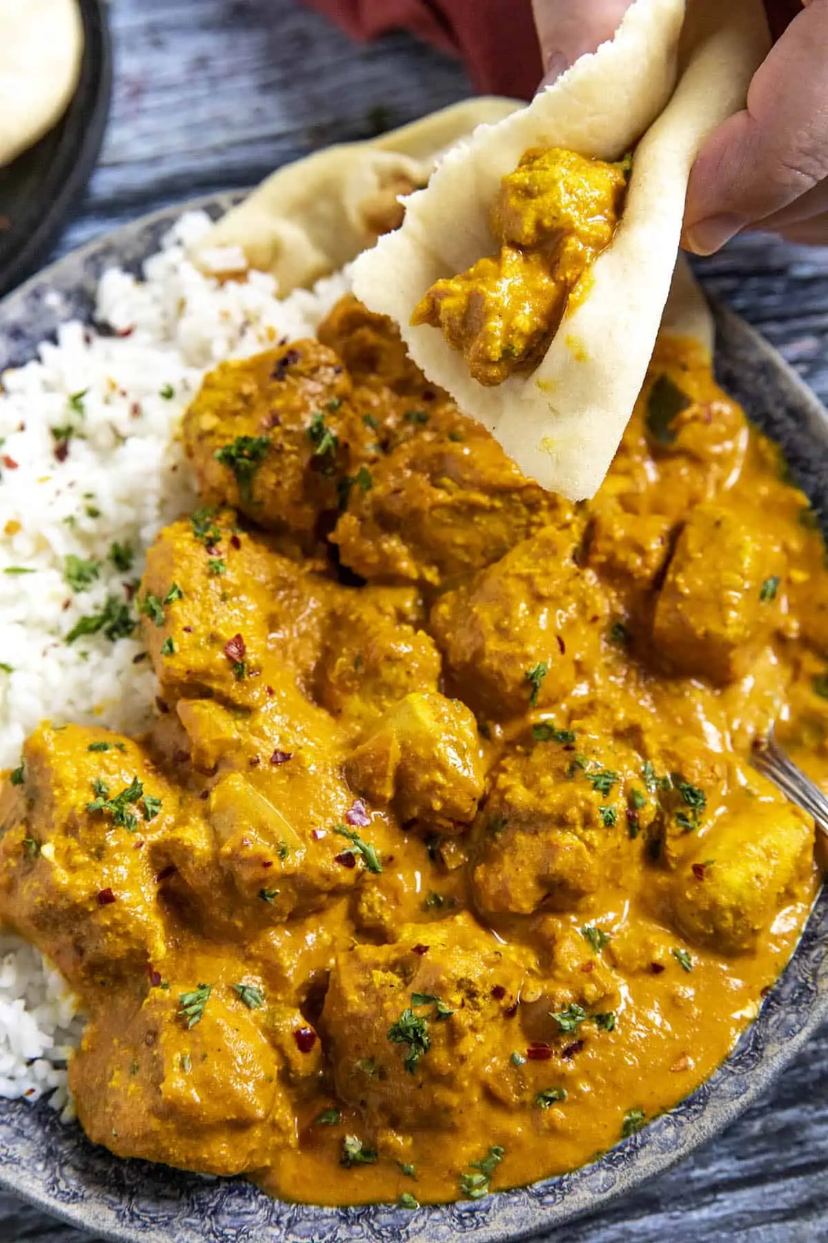 Chicken Tikka Masala on a piece of soft pita bread