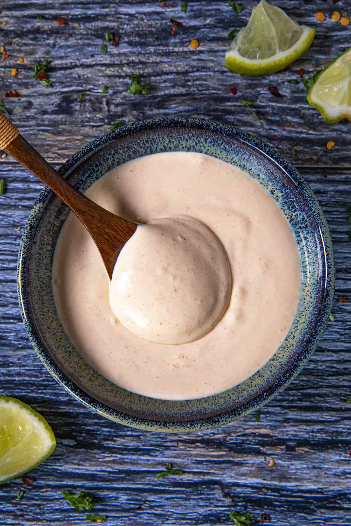 Fish Taco Sauce in a bowl with a spoon