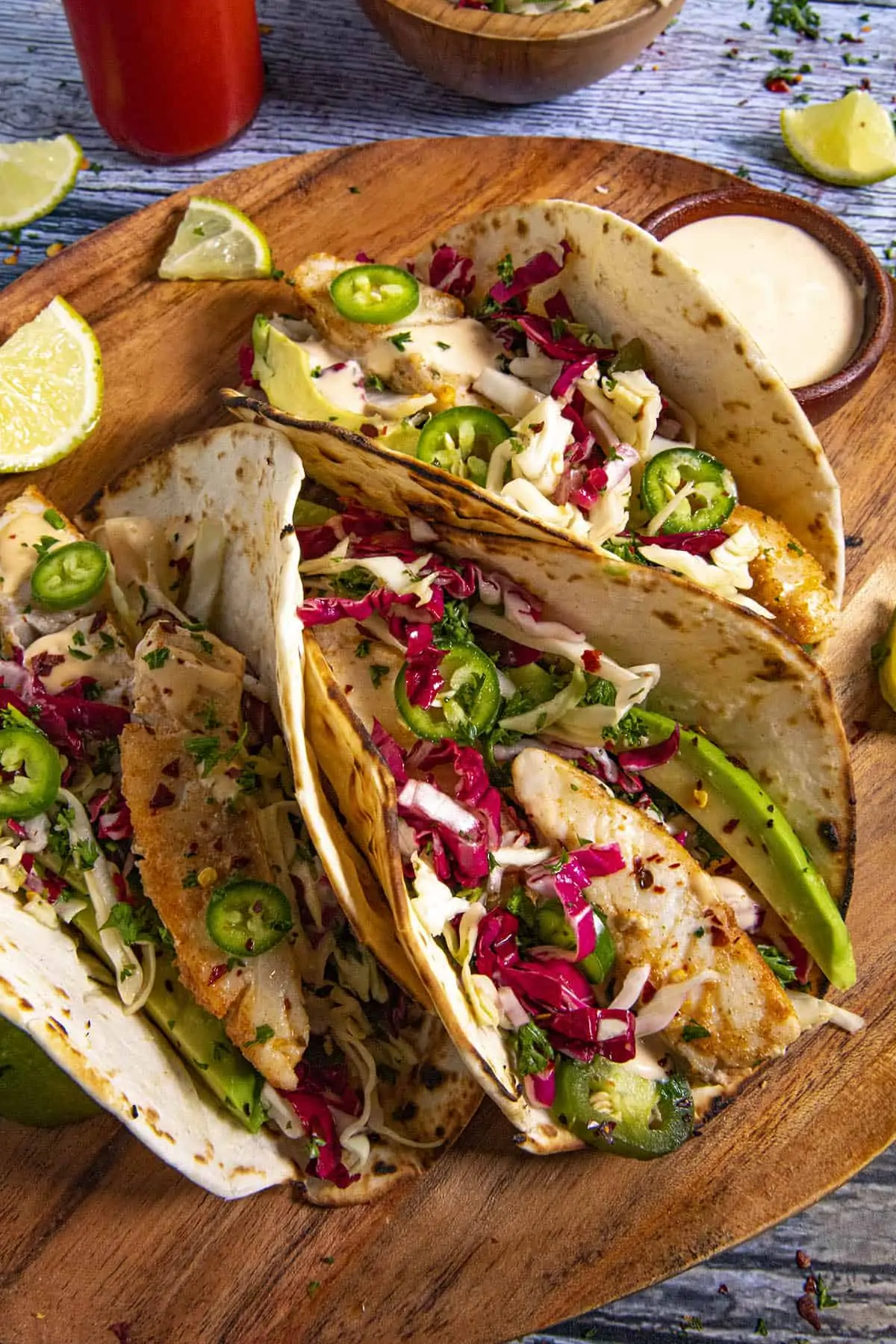 3 Fish tacos with crunchy slaw, avocado and creamy fish taco sauce