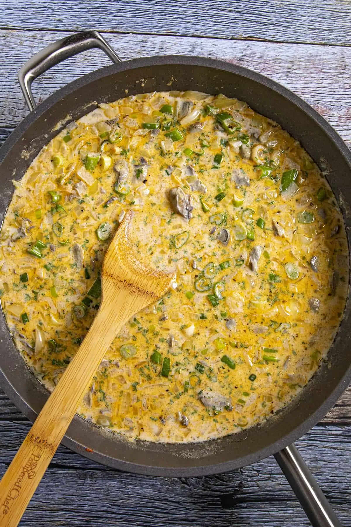 Stirring the Oyster Stew in the pan