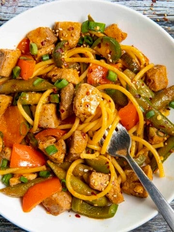 Pork Stir Fry in a white bowl