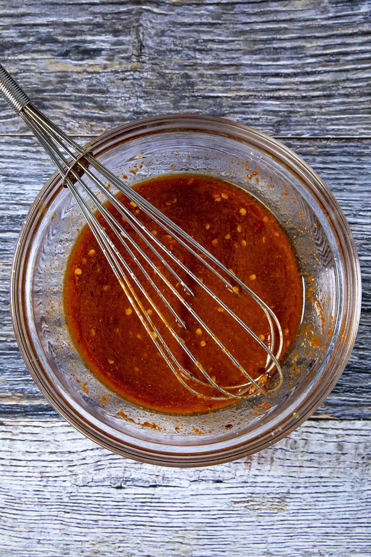 Whisking Stir Fry Sauce ingredients in a bowl.