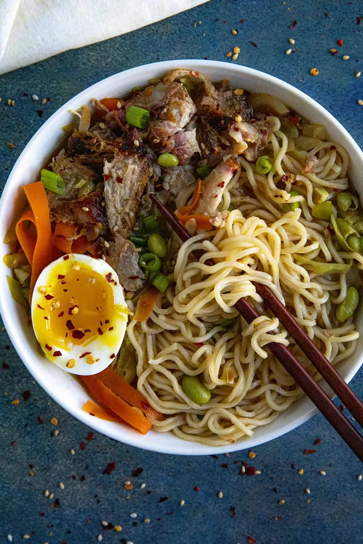 Miso Ramen in a bowl with pulled pork, soft boiled egg and lots of noodles