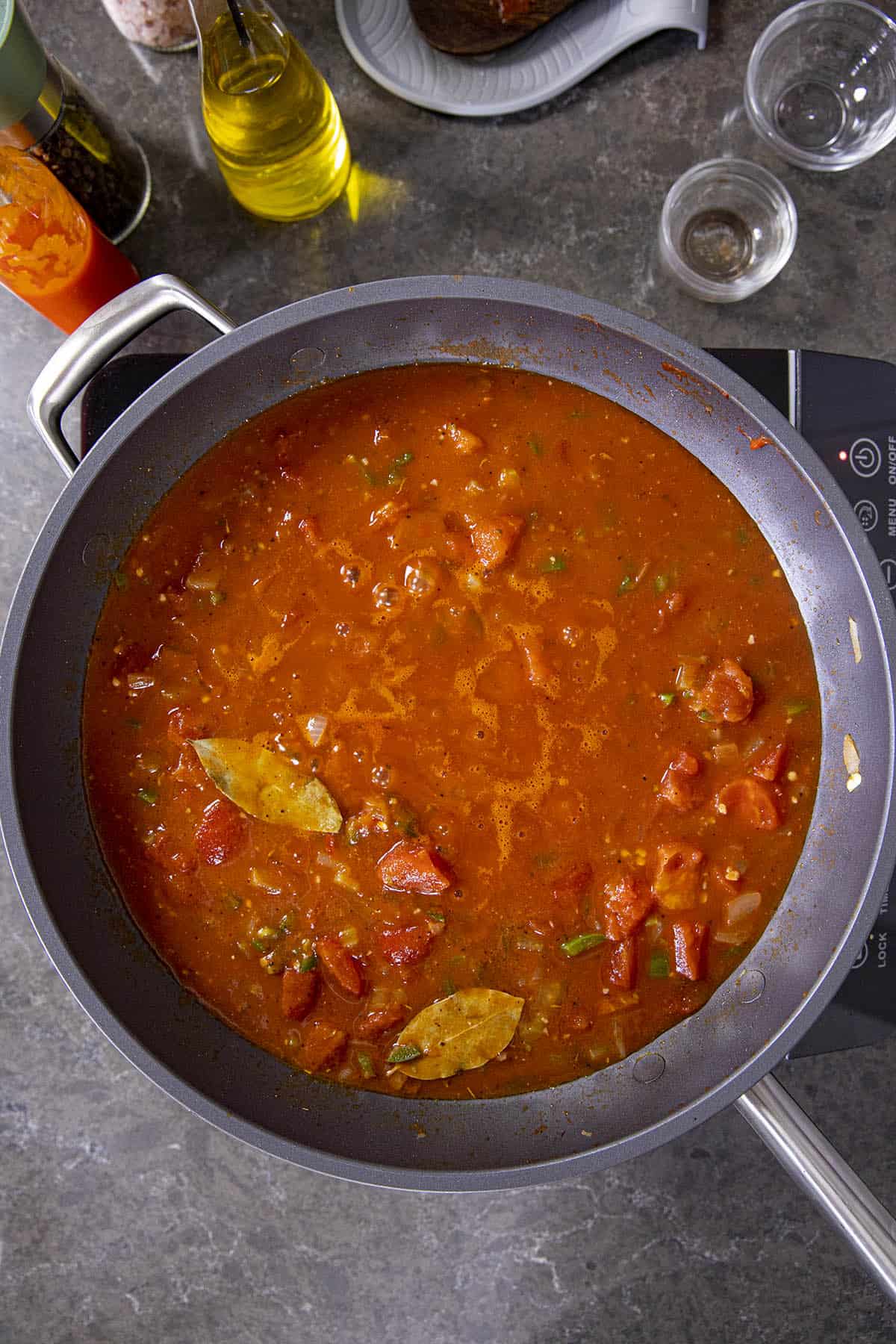 Shrimp Creole simmering in a hot pan