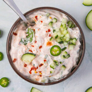 Raita recipe in a bowl.