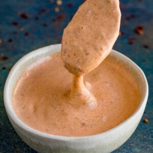 Creamy Chipotle Mayo dripping from a spoon