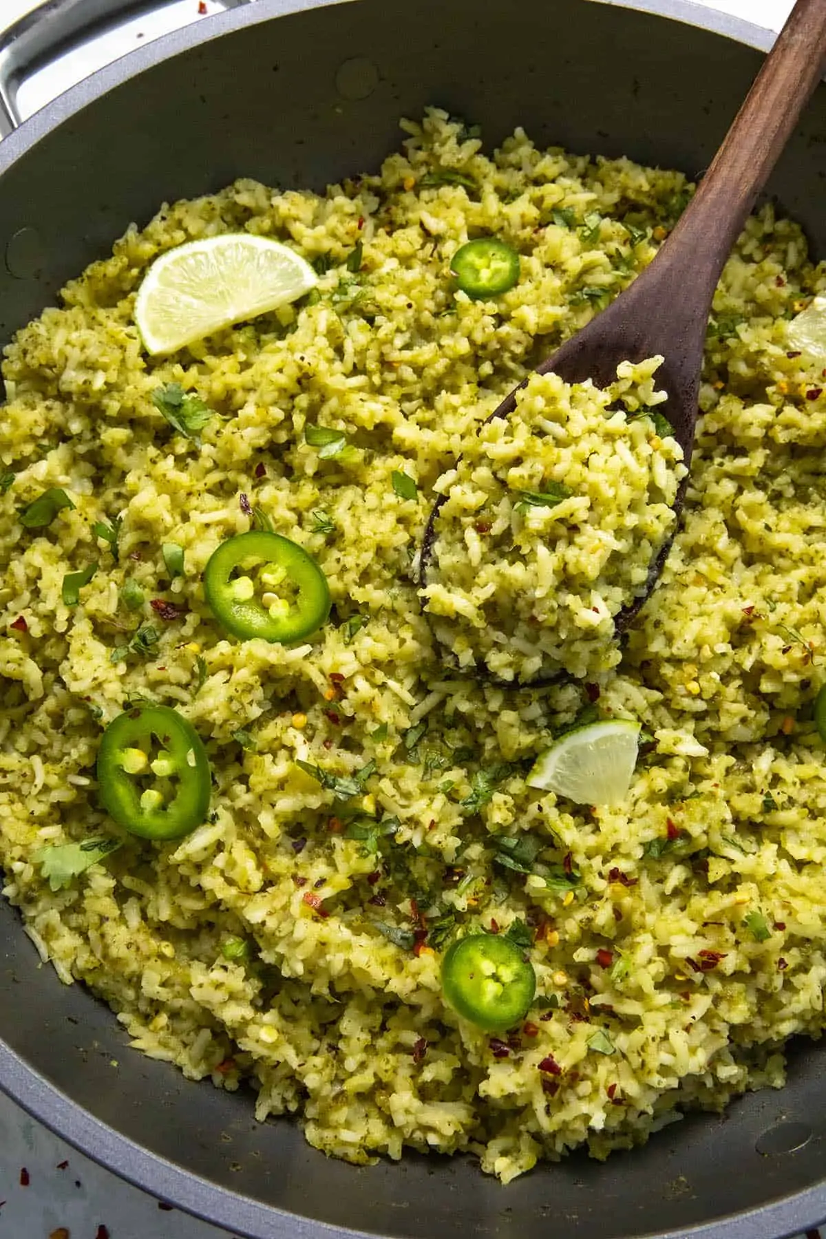 Serving Arroz Verde from the hot pan.