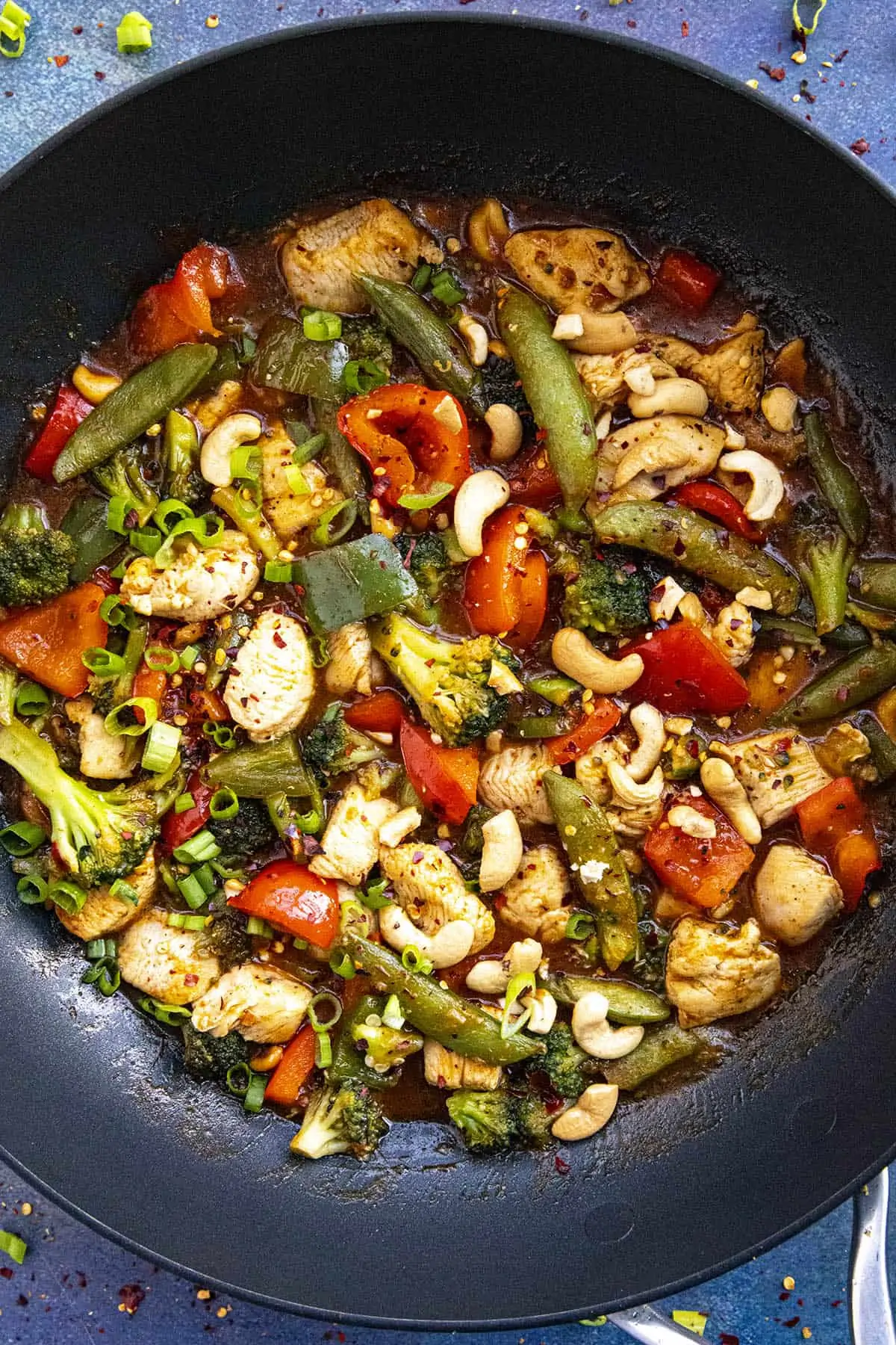 Chicken Stir Fry in a pan with garnish.